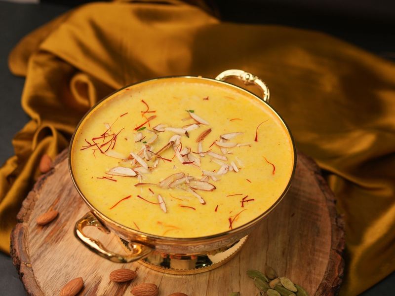 Saffron phirni topped with almonds